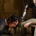 Merle tortura Glenn no S03E07 de The Walking Dead