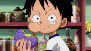 One Piece | Luffy criança comendo a Gomu Gomu no Mi.